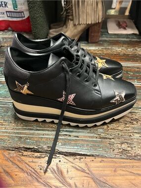 Stella McCartney Black Platform Lace-Up Sneakers with Multicolor Star Accents